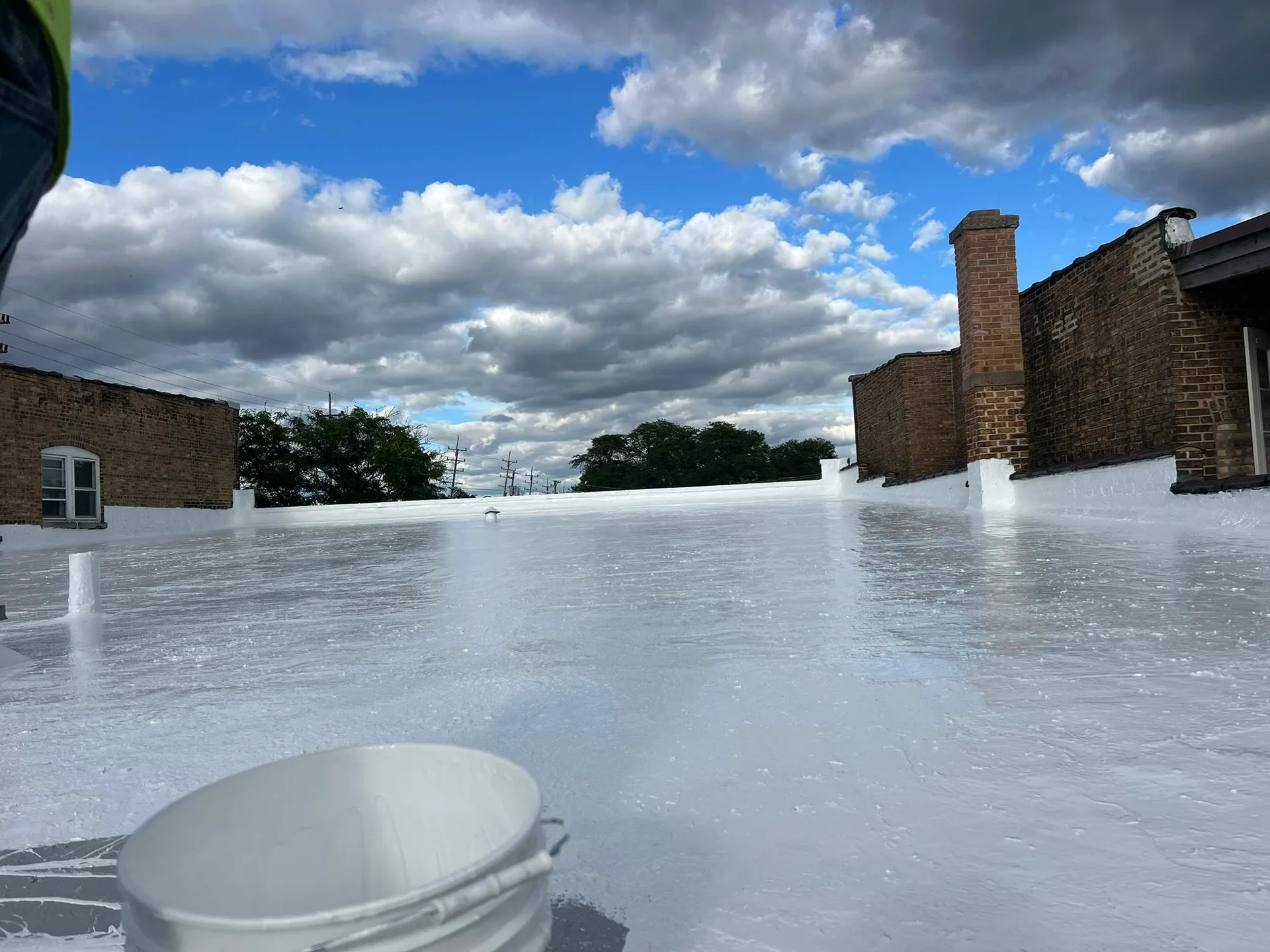 Completed roof coating restoration at retail center in Clarendon Hills IL by Americanstruction