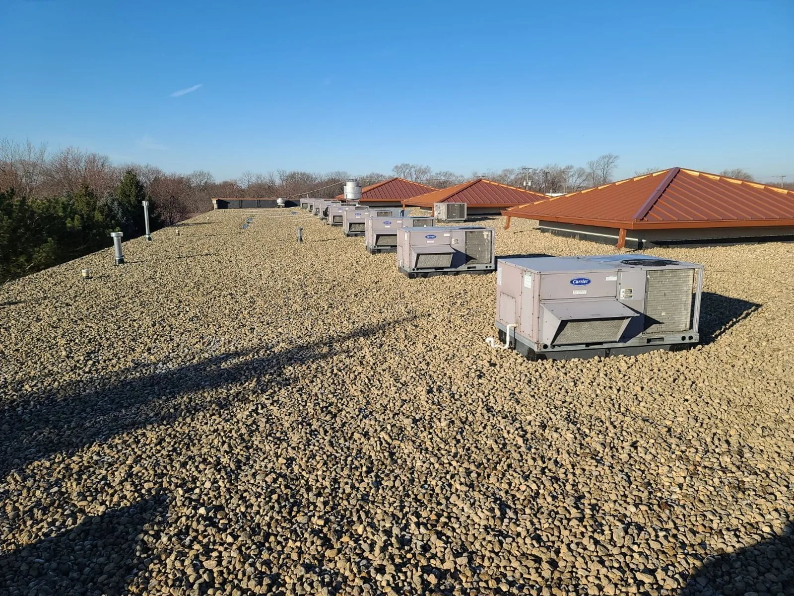 Completed ballasted EPDM recover at 1149 E 9th St with HVAC units installed