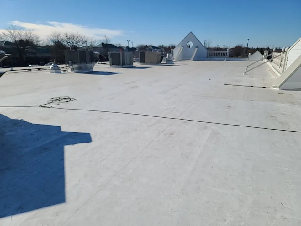Completed white PVC roof on Aurora retail center