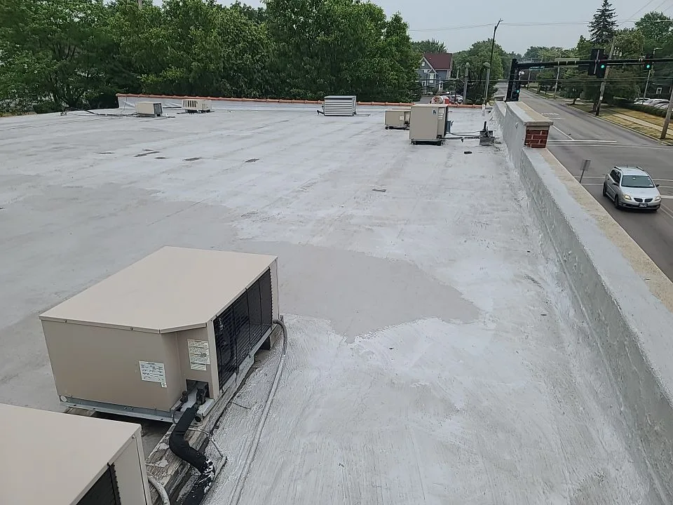 Failed retail roof on East New York Street Aurora IL before tear-off