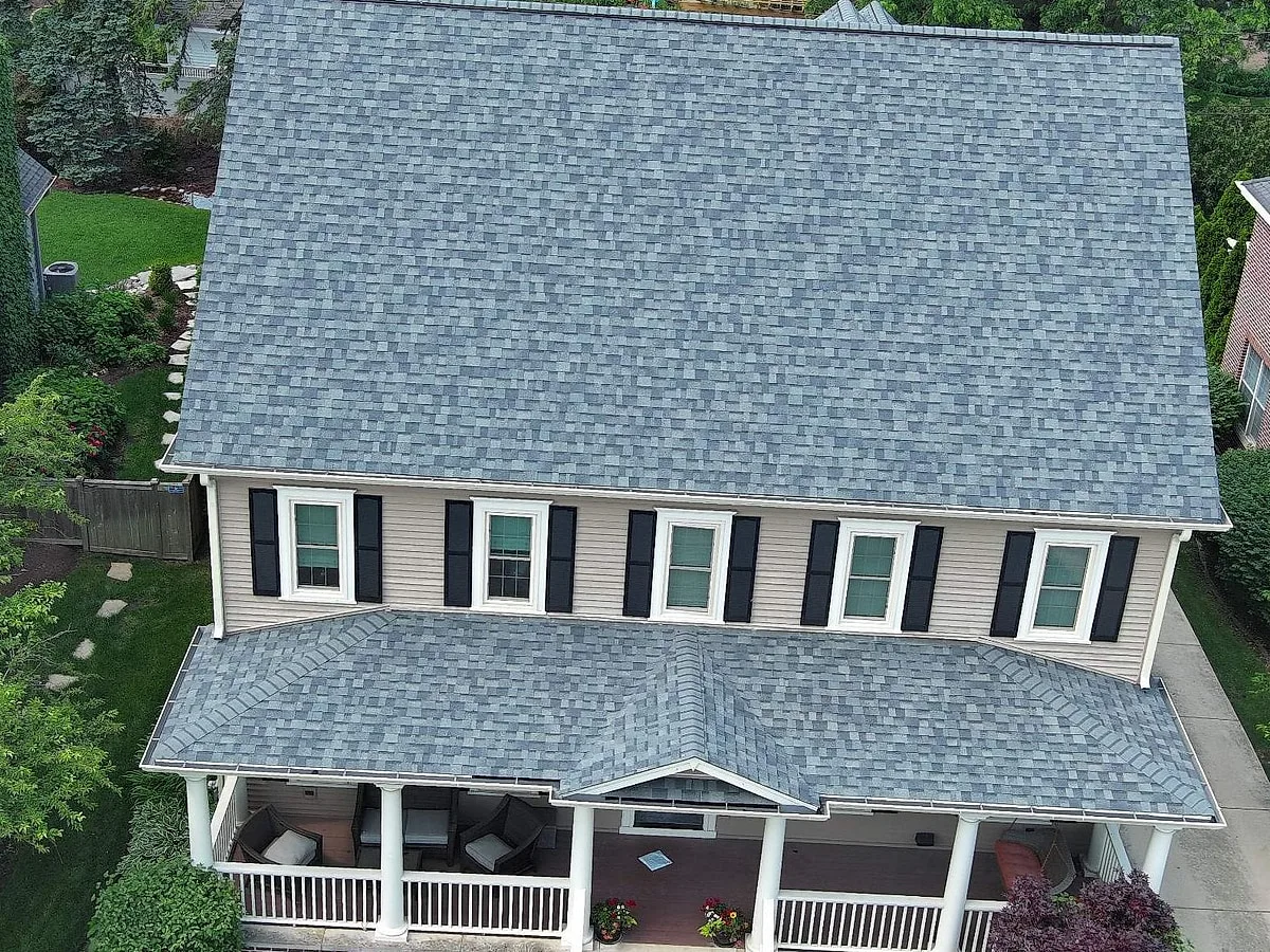 The Gantars' Clarendon Hills home after full exterior renewal with Onyx Black shingle and all-black trim package