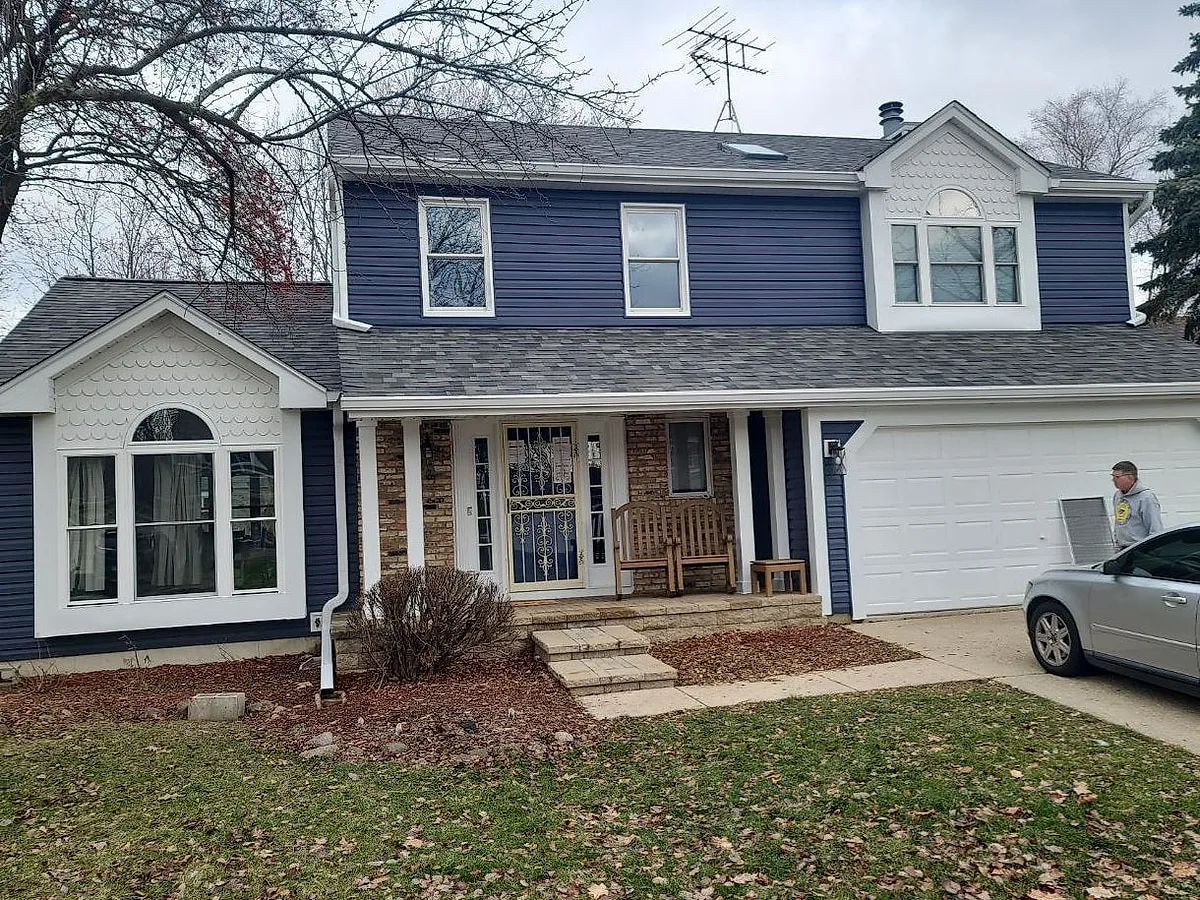 The Paisleys' Montgomery home with a new Owens Corning Duration Estate Gray architectural shingle roof