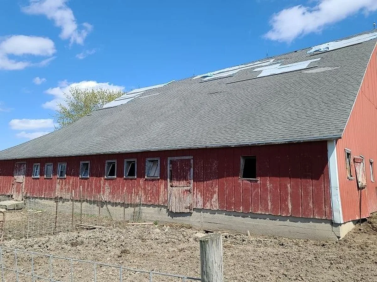 The Schmaedeke's Peotone barn with a failing roof before replacement