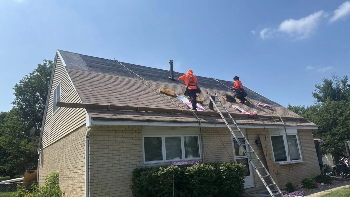 Residential roofing crew working on a home in Mokena IL