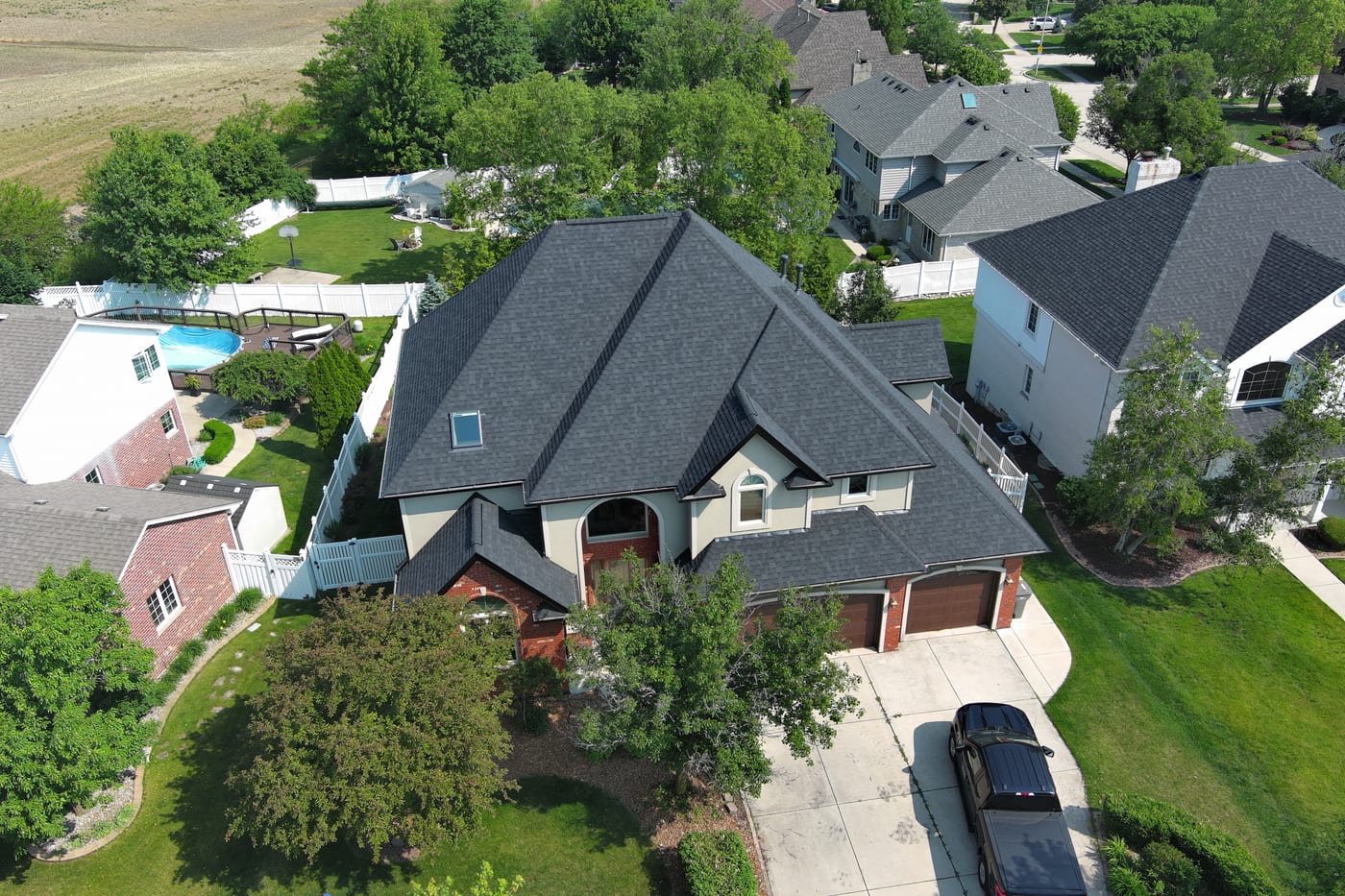 Completed shingle roof on Orland Park home, drone view